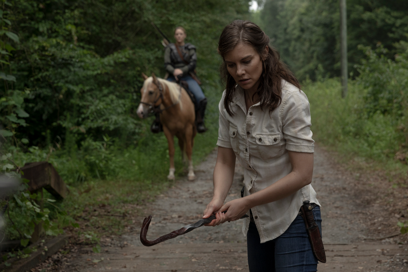 Maggie (Lauren Cohen) helps a zombie take a nap. Forever.